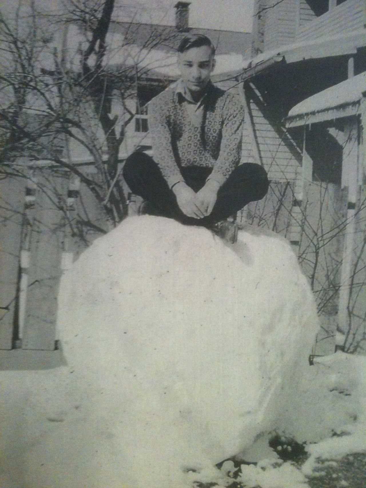 Josh's paternal grandfather sitting on a giant snowball Josh's paternal grandfather sitting on a giant snowball